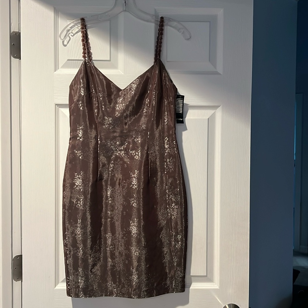 NWT. Laundry brown dress with flower straps. Floral detailing. Size 4